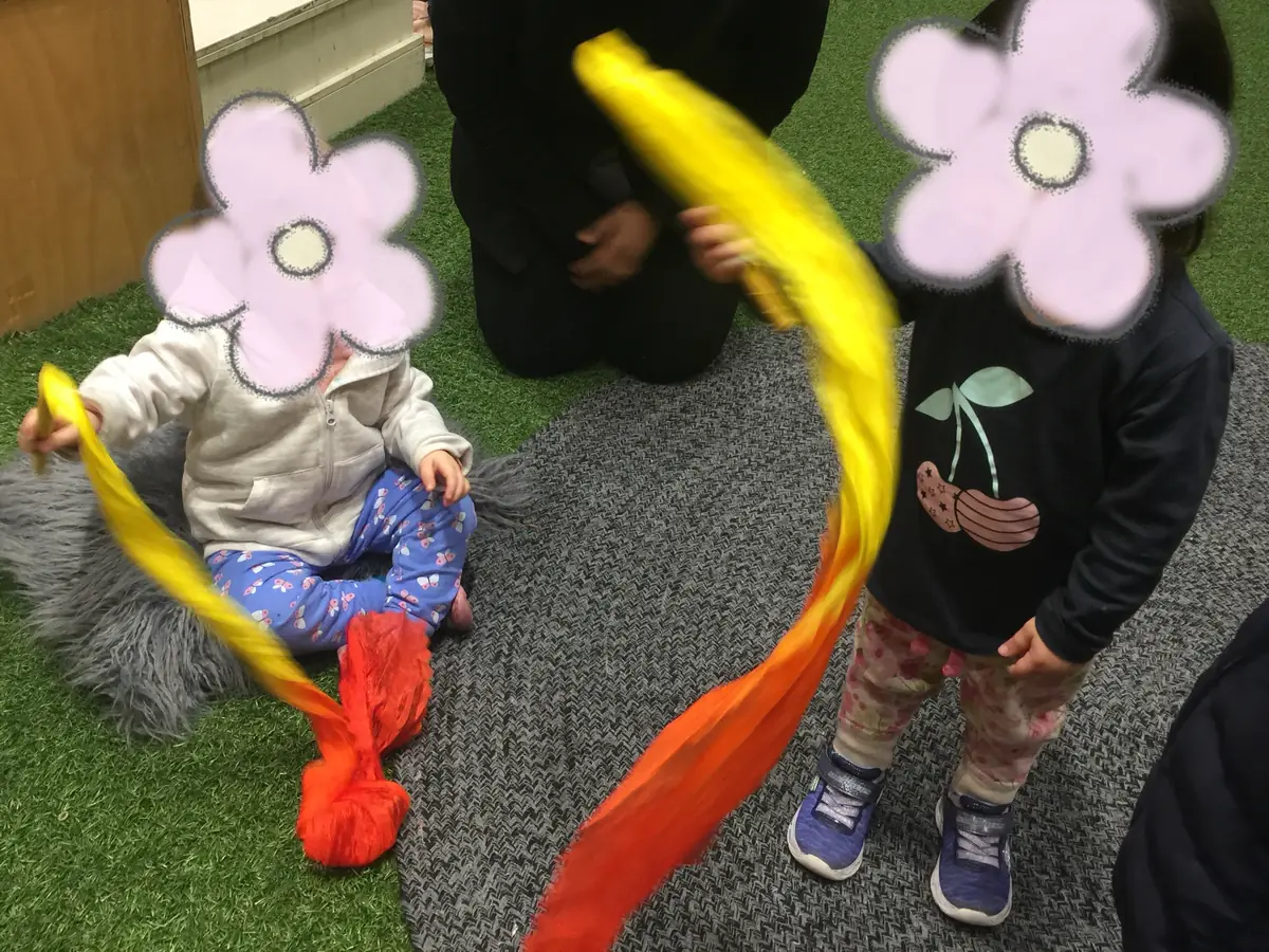 Children dancing with silk ribbons