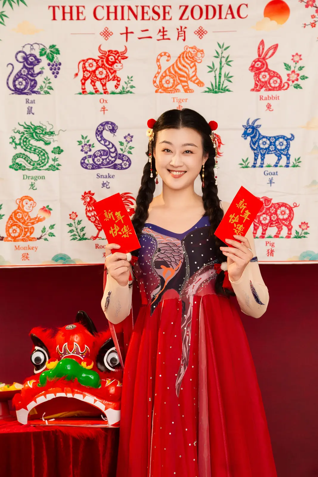 Raina holding lucky red envelopes